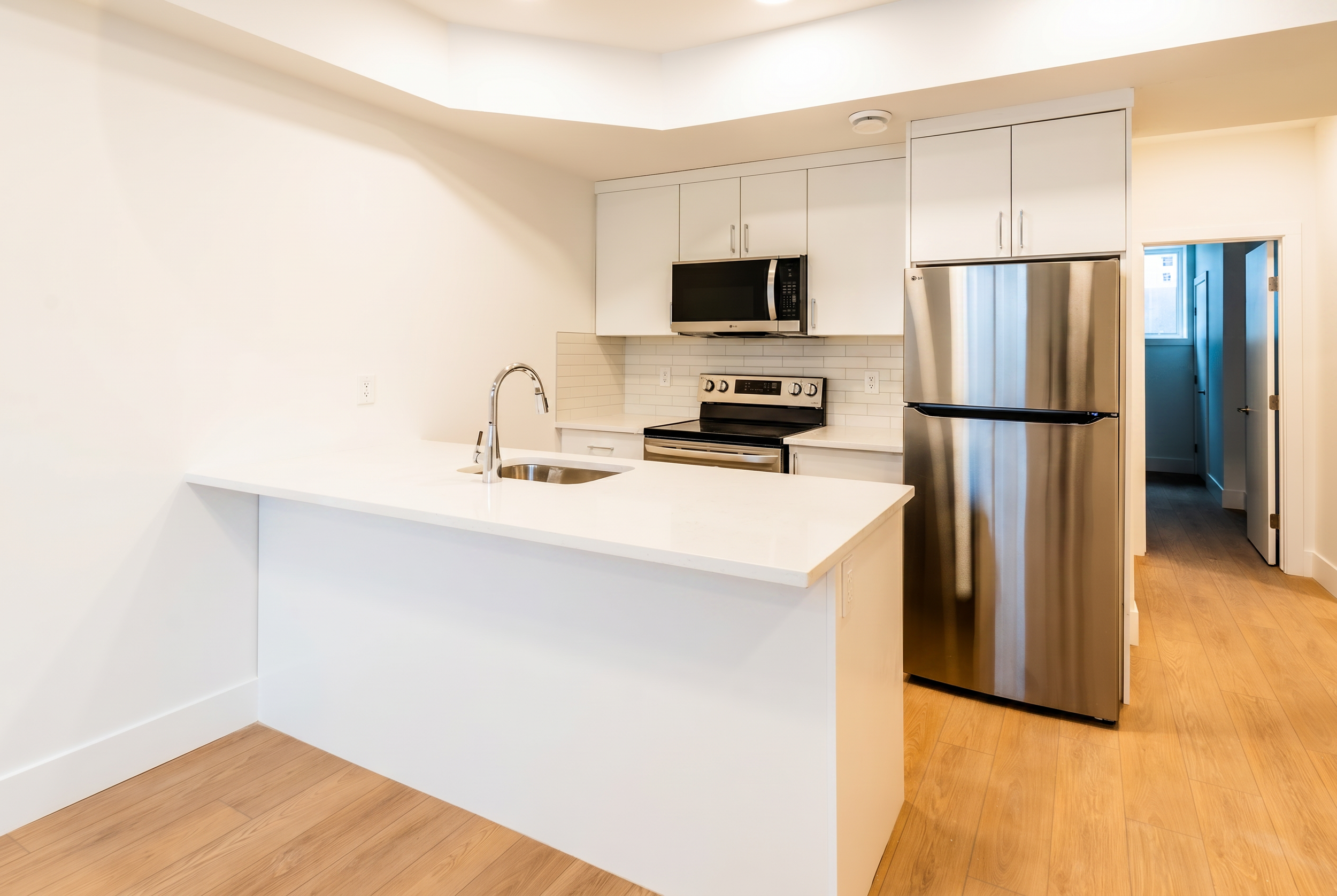 Unit 104R (1 Bed • 1 Bath • Lower Suite ~689 sq ft Starting at $1,745 - Available)
