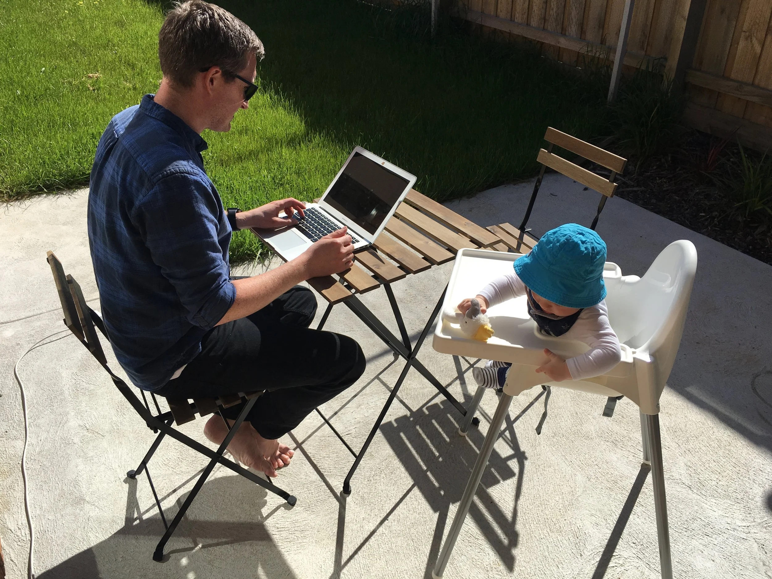 Eric getting some admin work done on a sunny afternoon with Ezra hanging out&nbsp;