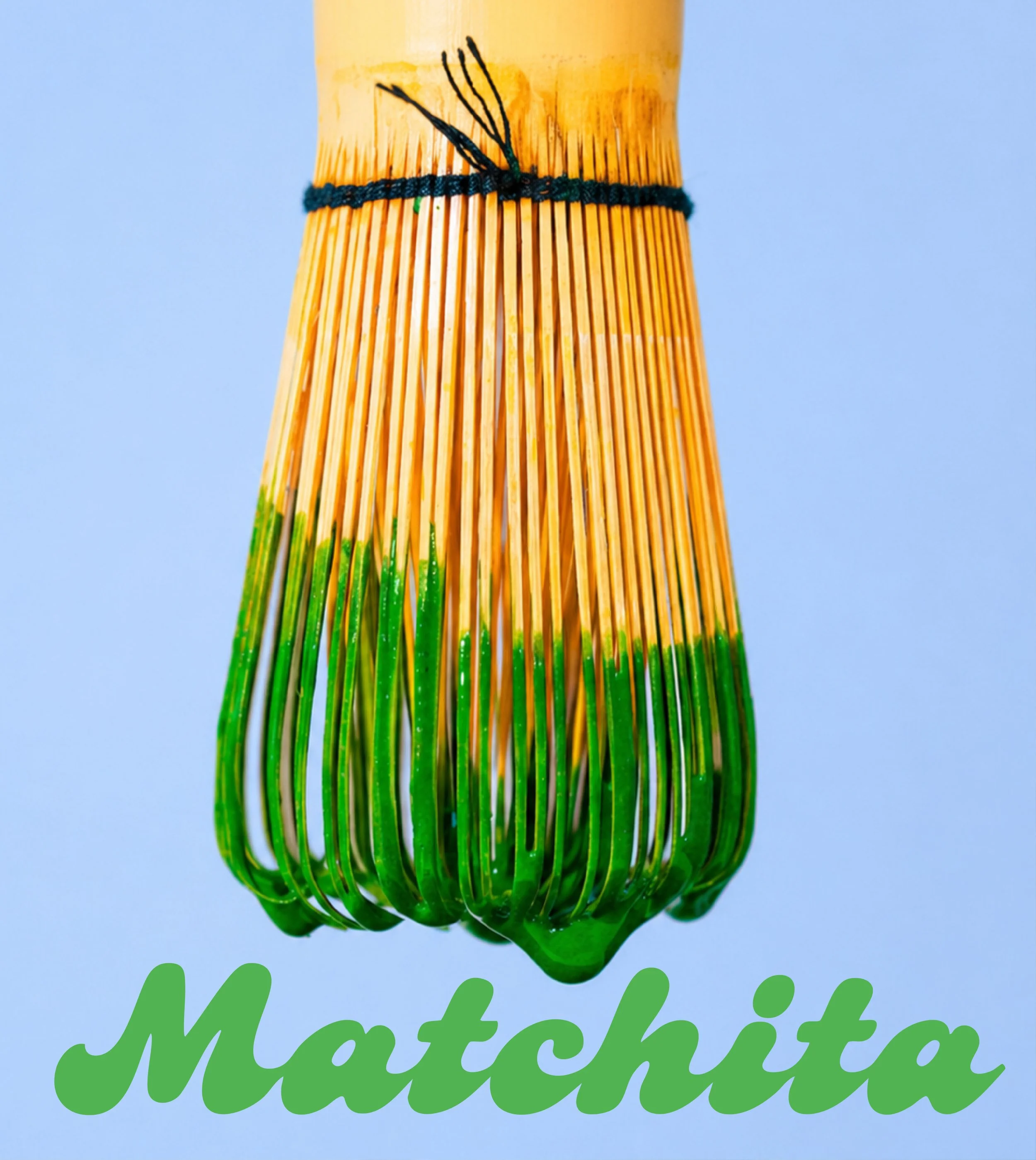 Close-up of a green fluorescent mosquito swatter with a black string on a light blue background. Part of a text reads 'Matshito' in green cursive font.