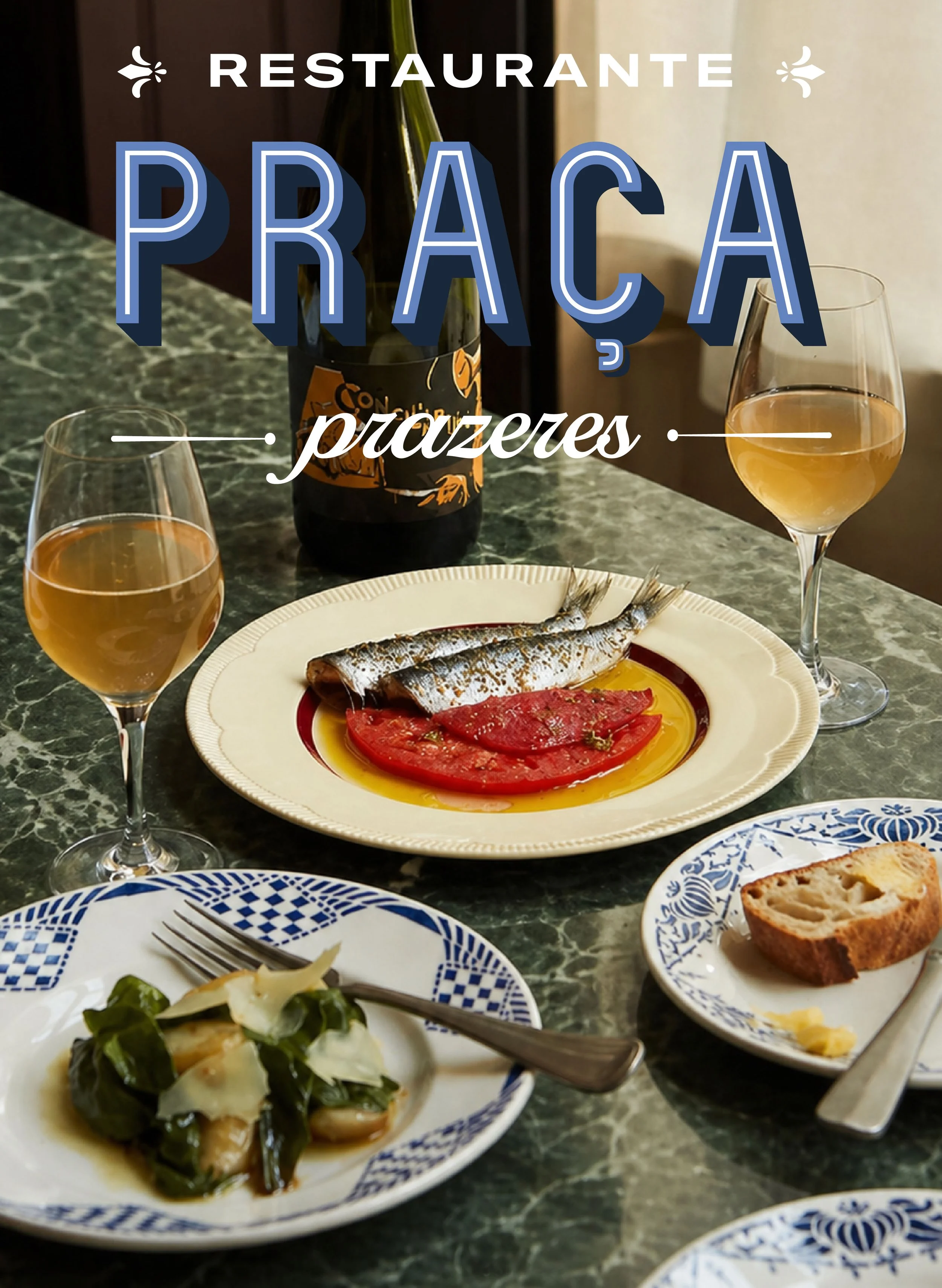 A plate with tomato slices and grilled fish, a glass of white wine, a bottle, and a green marble table. Behind the plate are two more glasses of white wine and some other plates with food.
