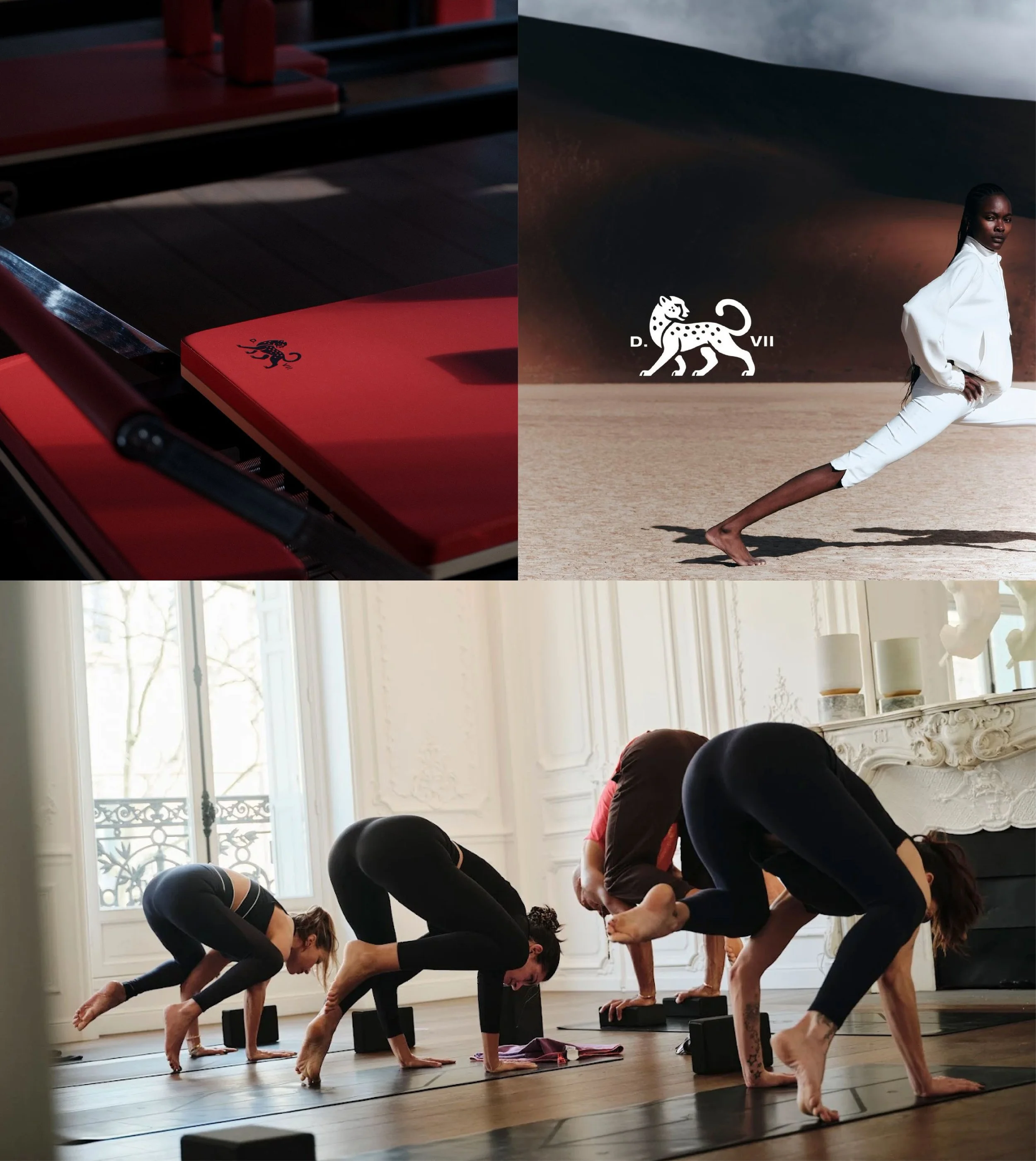 Group of people practicing yoga in a bright room with large windows, all in downward dog pose on yoga mats.