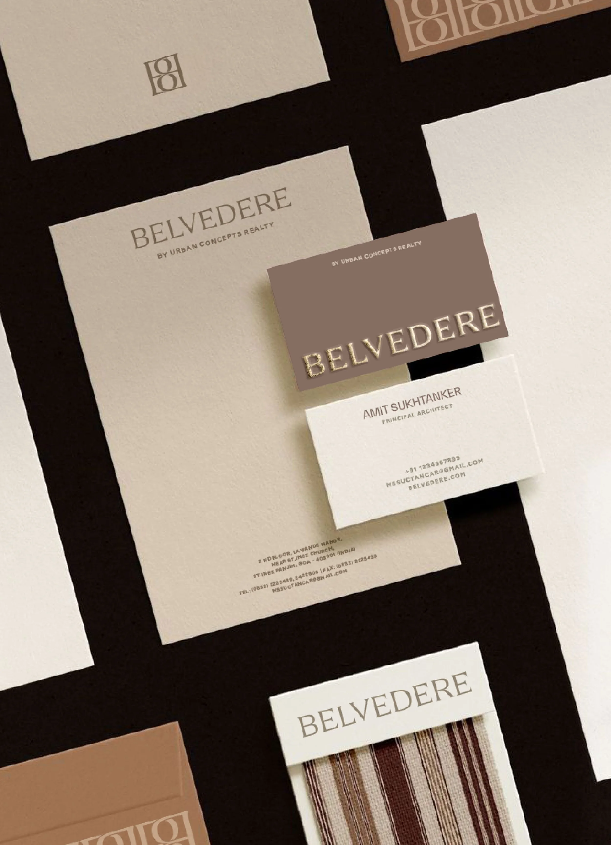 Collection of branding and graphic design samples for Belvedere by Urban Concepts Realty, including business cards, letterhead, and sample fabric patterns on a black background.