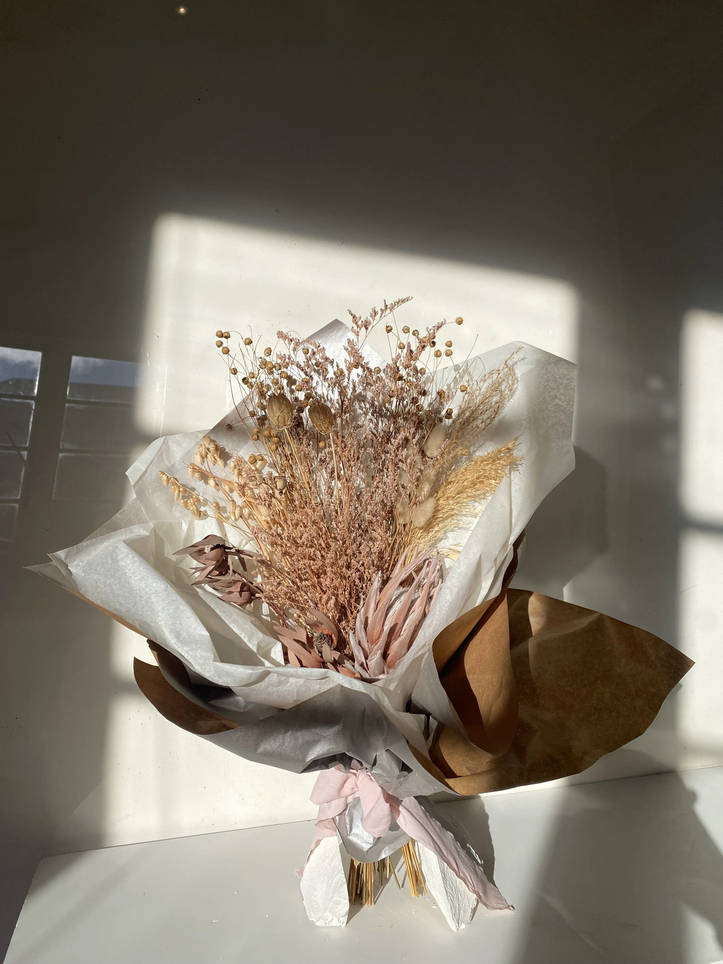 Protea + linseed bouquet