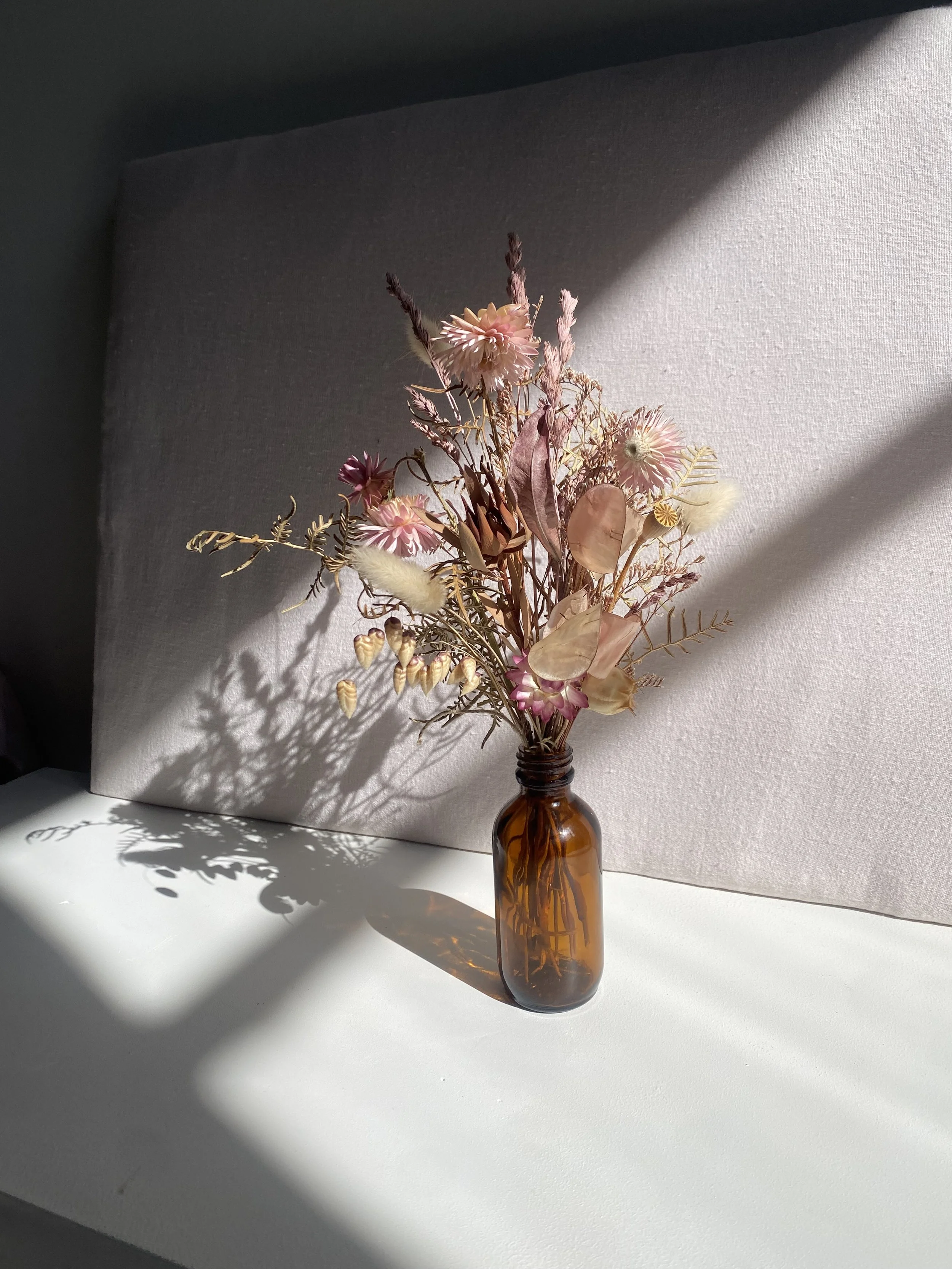 mini pink daisy + fern in vase