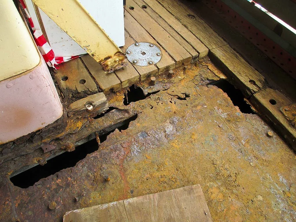 Badly-rusted-main-deck-teel-over-engine-room.jpg