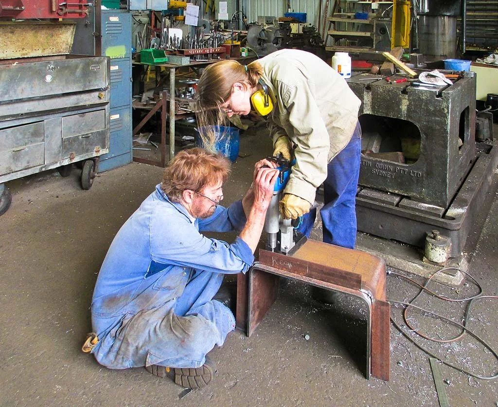 Don-and-Dianne-drilling-holes-in-new-pilots-cabin-skylights-base.jpg