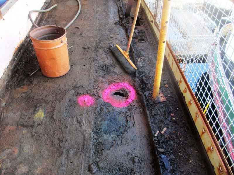 Earlier image of rusted steel main deck over engine room