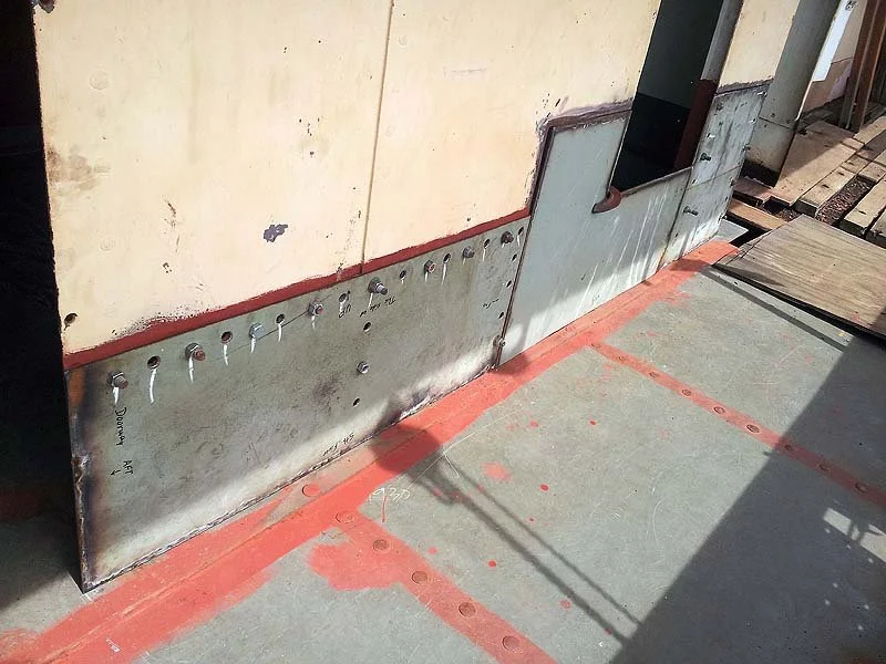 Steel deck above engine room with new coaming inserts