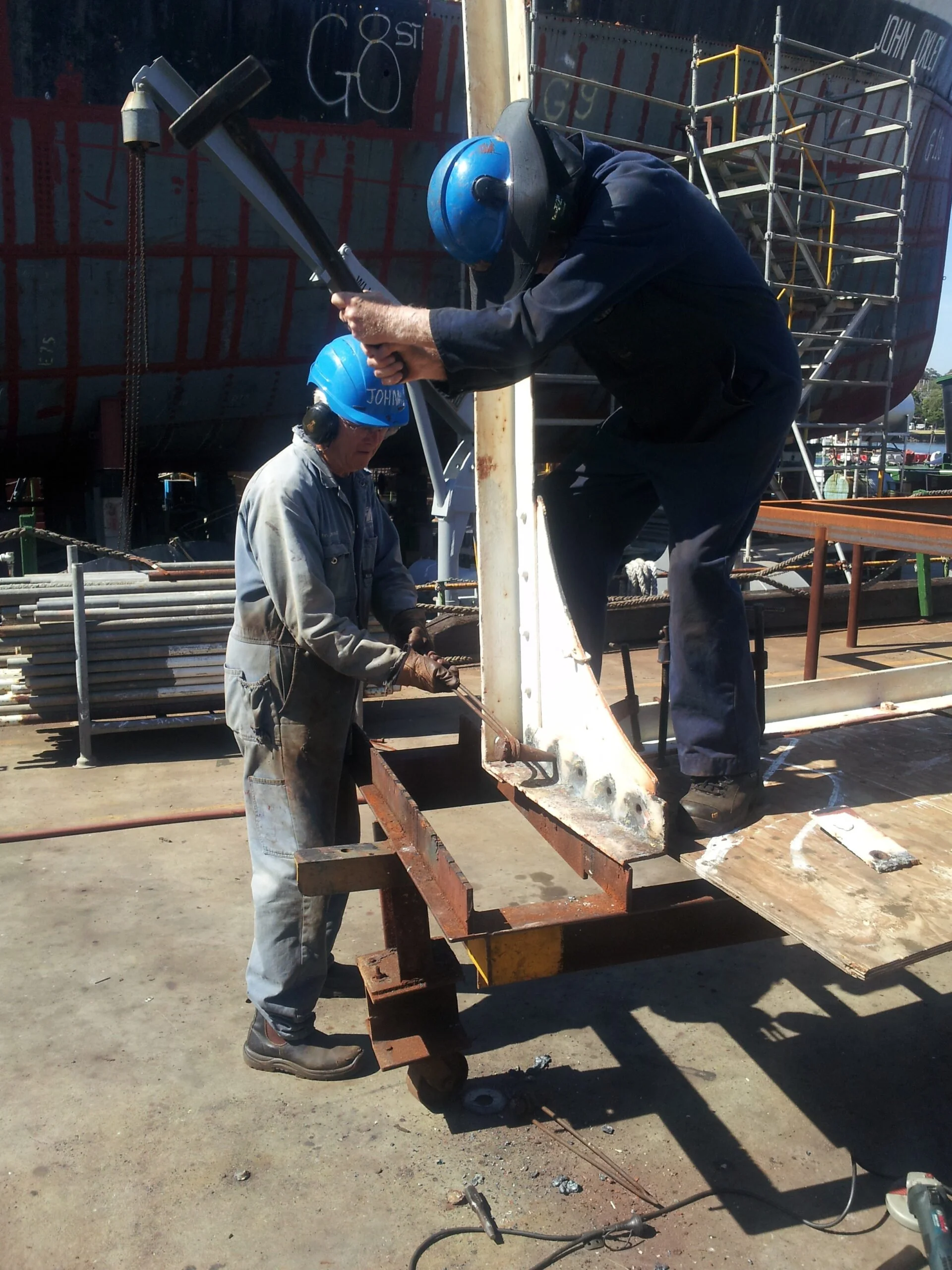 Removing rivets from bridge deck supports