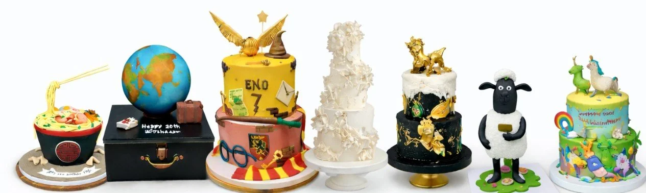 A row of eight colorful cakes themed around toys, animals, and pop culture with various decorations.