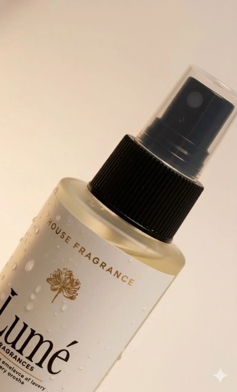 A spray bottle labeled with the brand name 'Iumé' and the words 'Home Fragrance' on a white background.