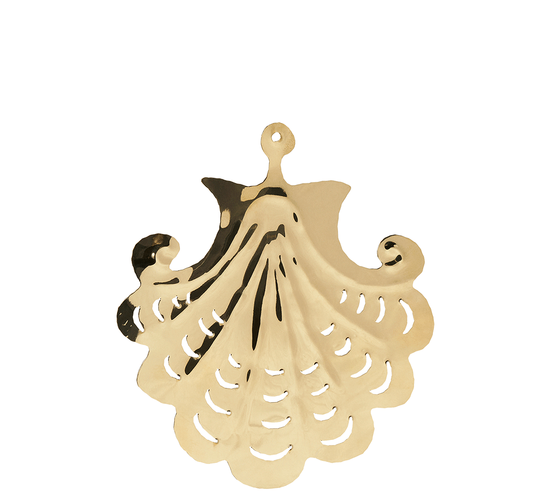 A decorative metal ornament shaped like a ballerina in a tutu, with a spiral pattern, against a black background.