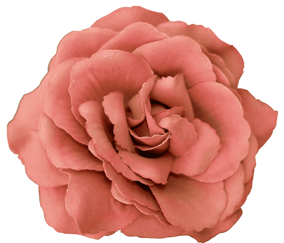A close-up of a pink artificial rose with layered petals.