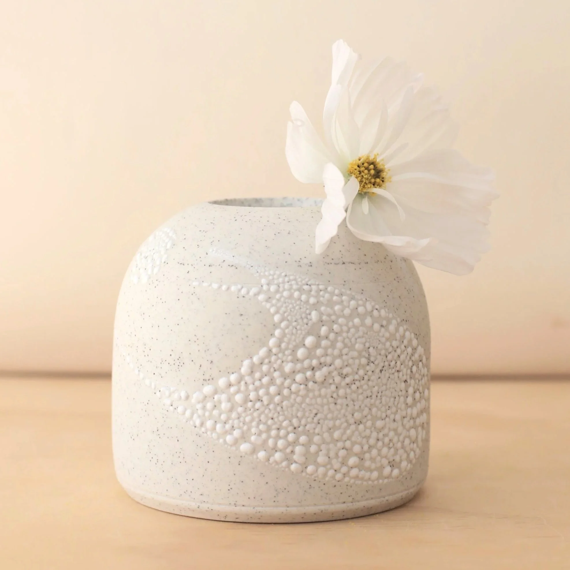 Speckly white ceramic vase