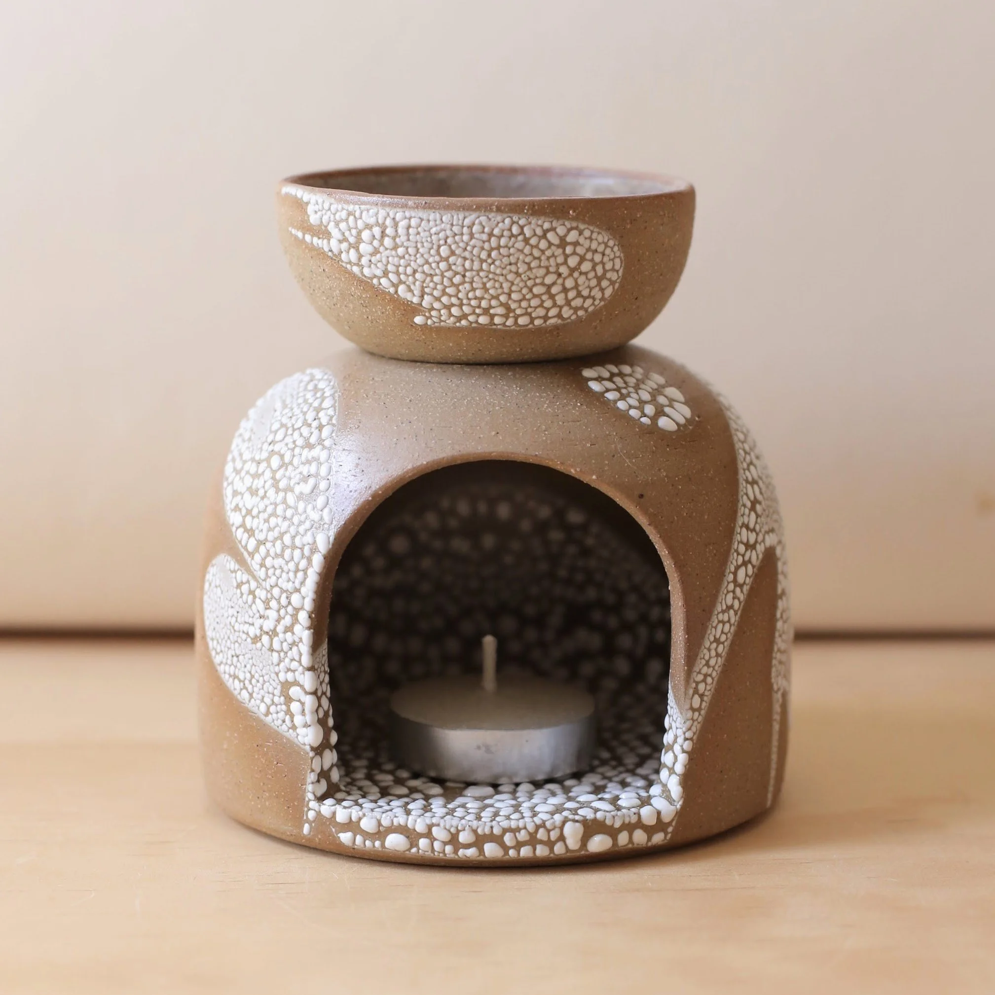 Ceramic oil burner in earthy