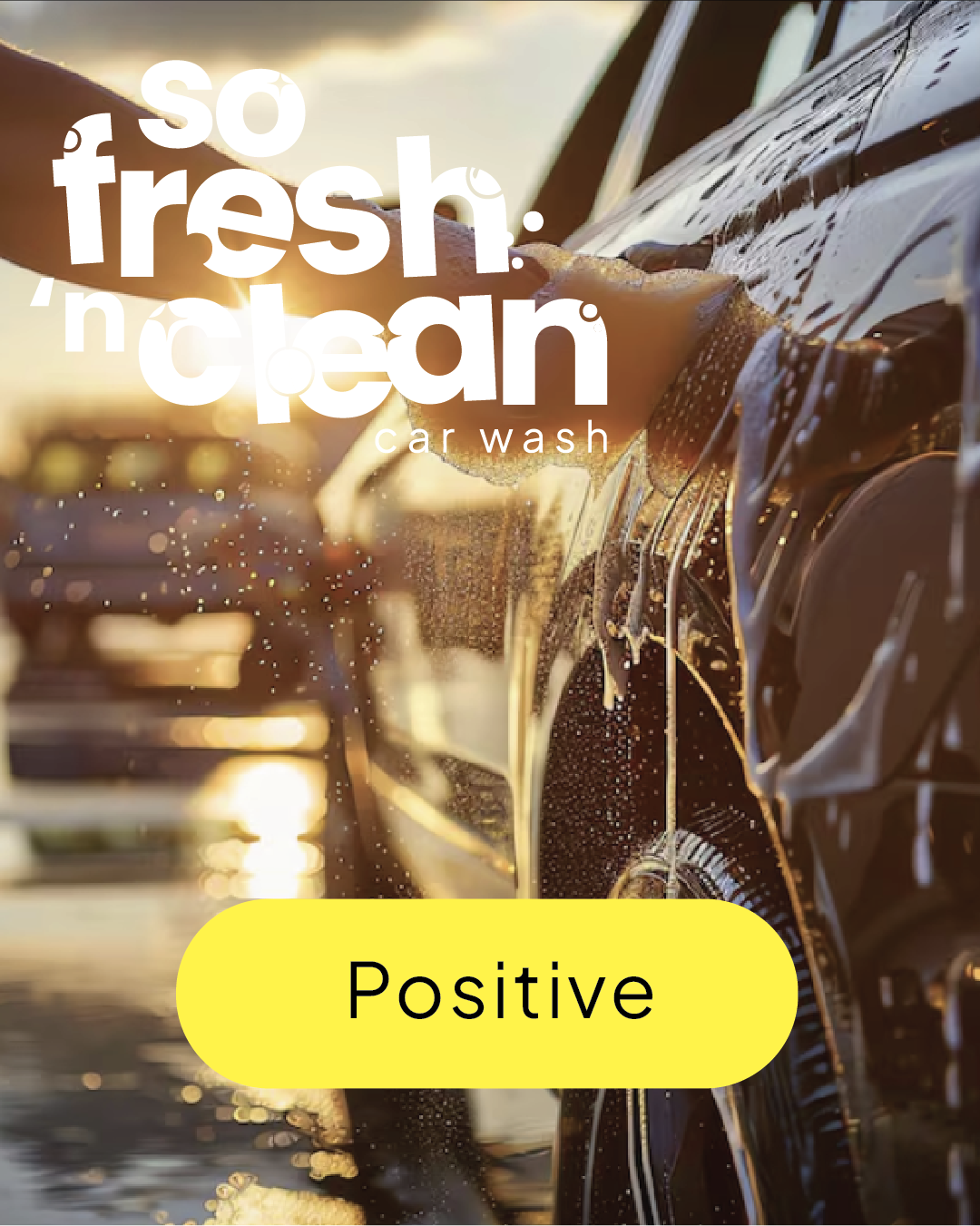 Close-up of a car being washed with soap and water, sunlight in the background, with overlay text 'So fresh. Clean.' and a yellow button labeled 'Positive' | So Fresh n Clean Mobile Car wash | Dubai