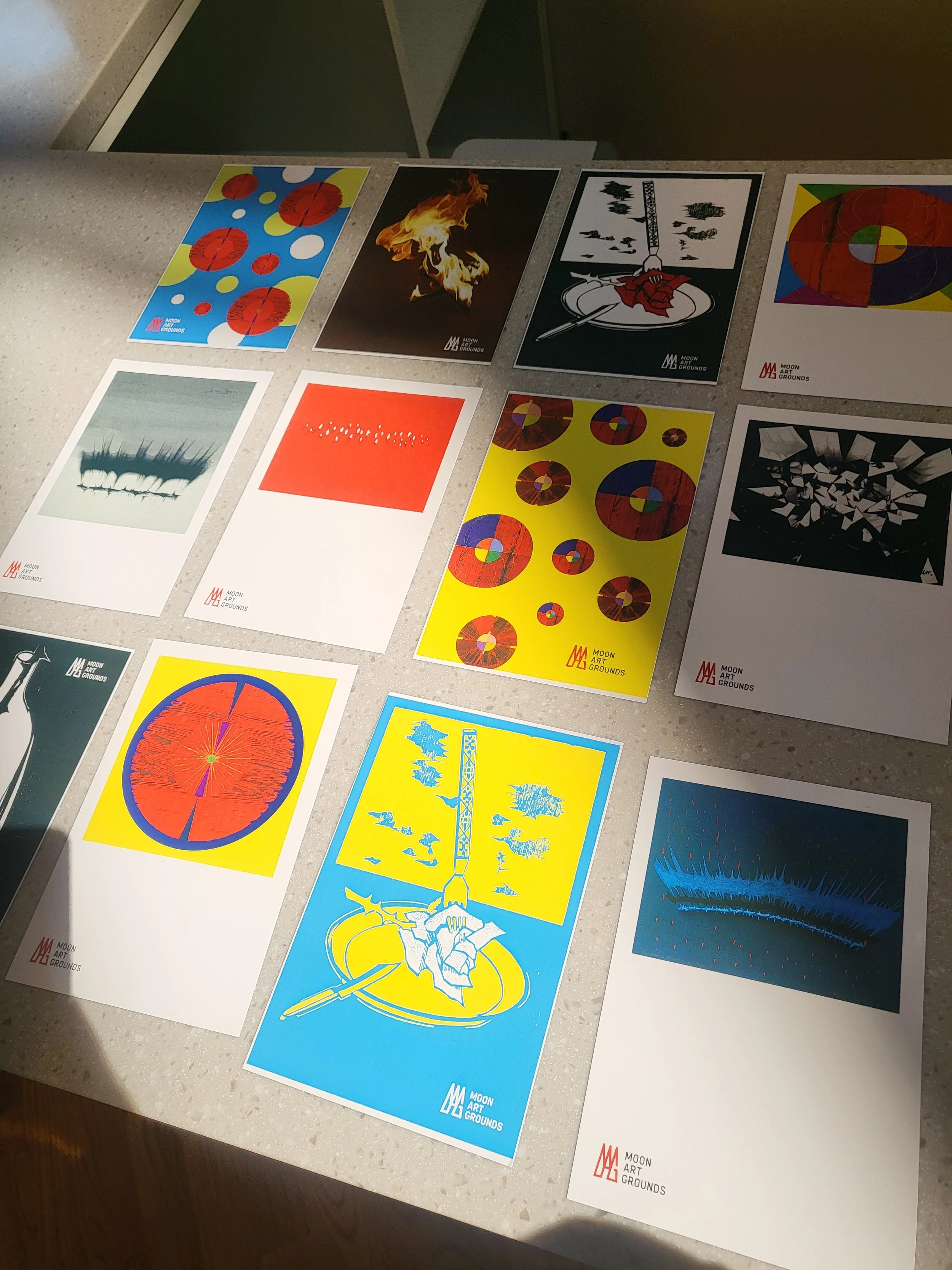 Moon Art Grounds exhibition posters for Burnsoo Song — abstract art, flames and symbolic imagery on display