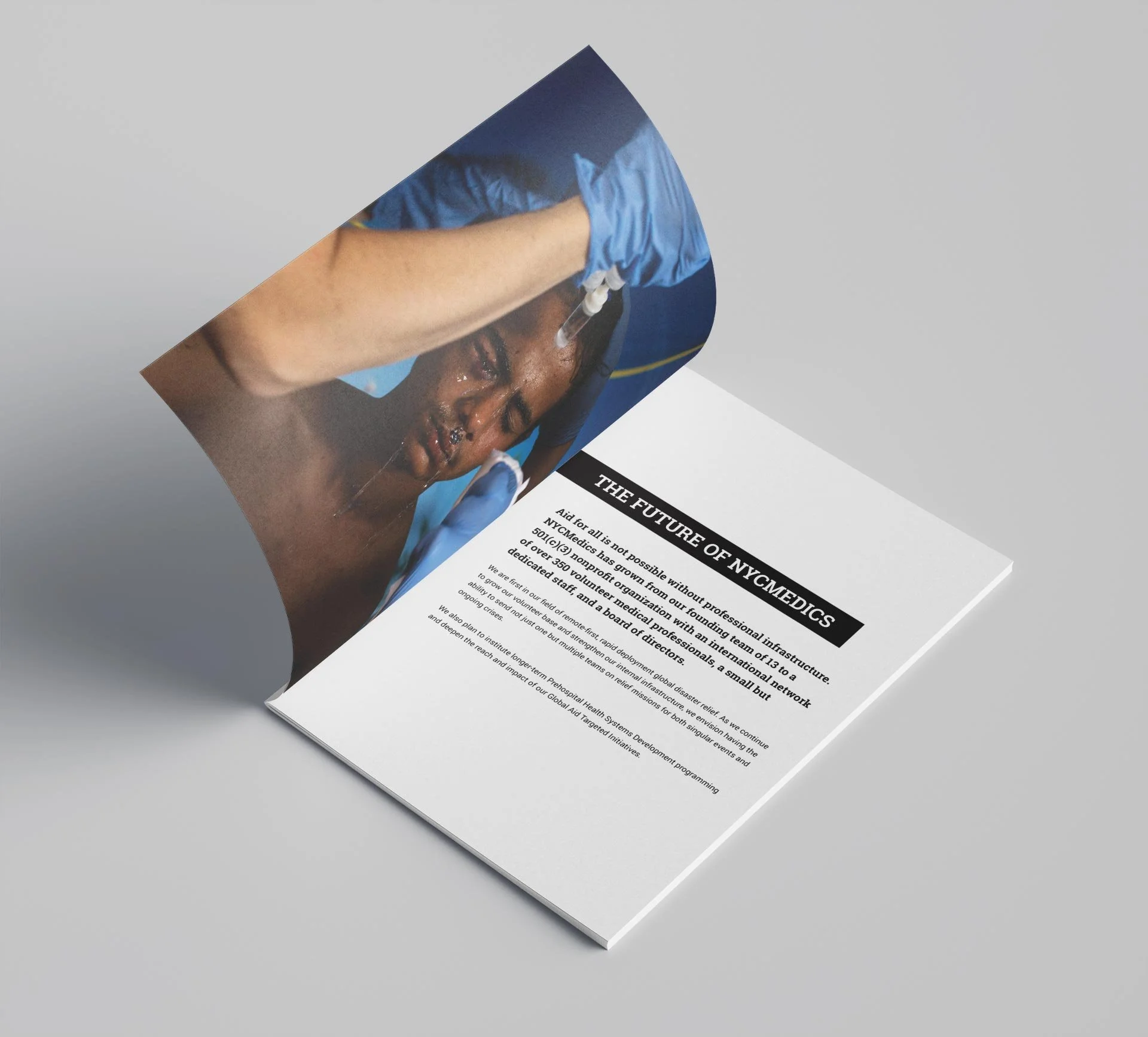 A photograph of a medical brochure featuring a healthcare professional wearing blue gloves, examining a patient with a serious injury or illness.