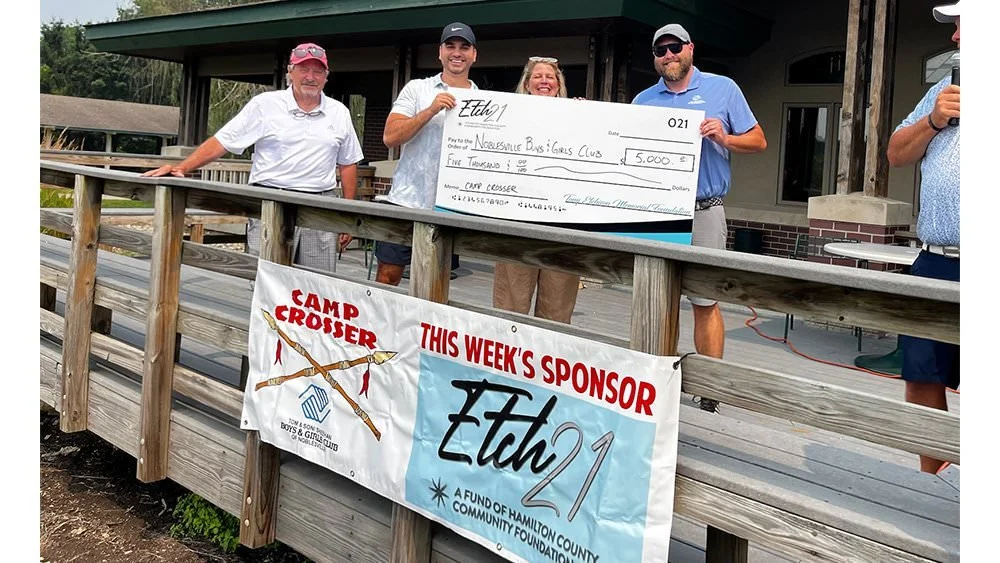 Recipients of a check from the Tony Etchison Memorial Foundation