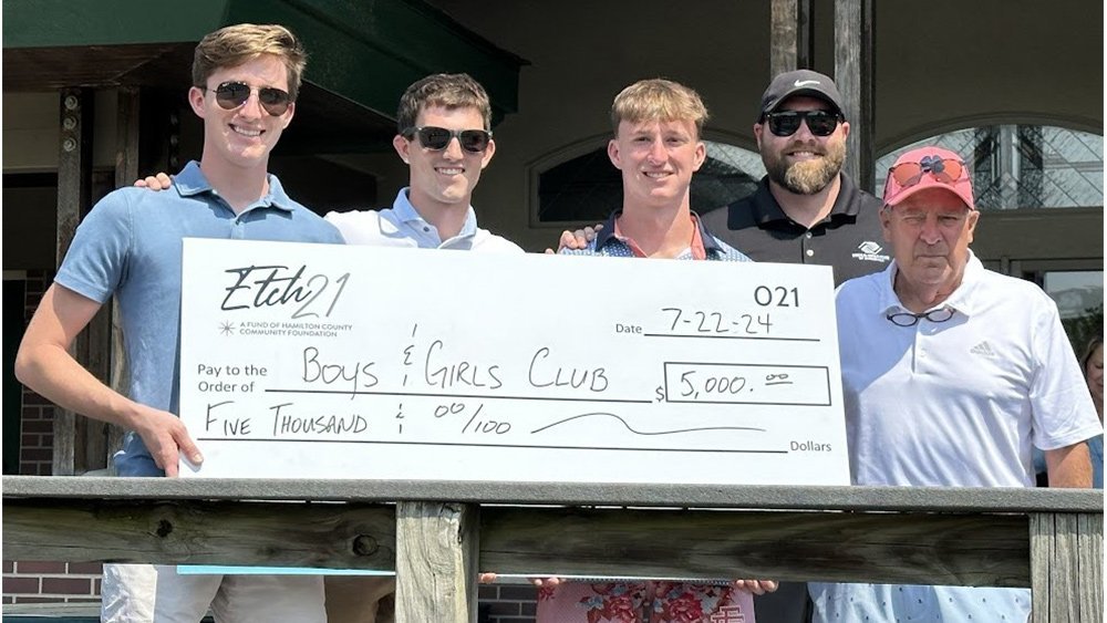 Recipients of a check from the Tony Etchison Memorial Foundation