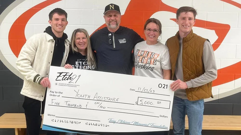 Recipients of a check from the Tony Etchison Memorial Foundation