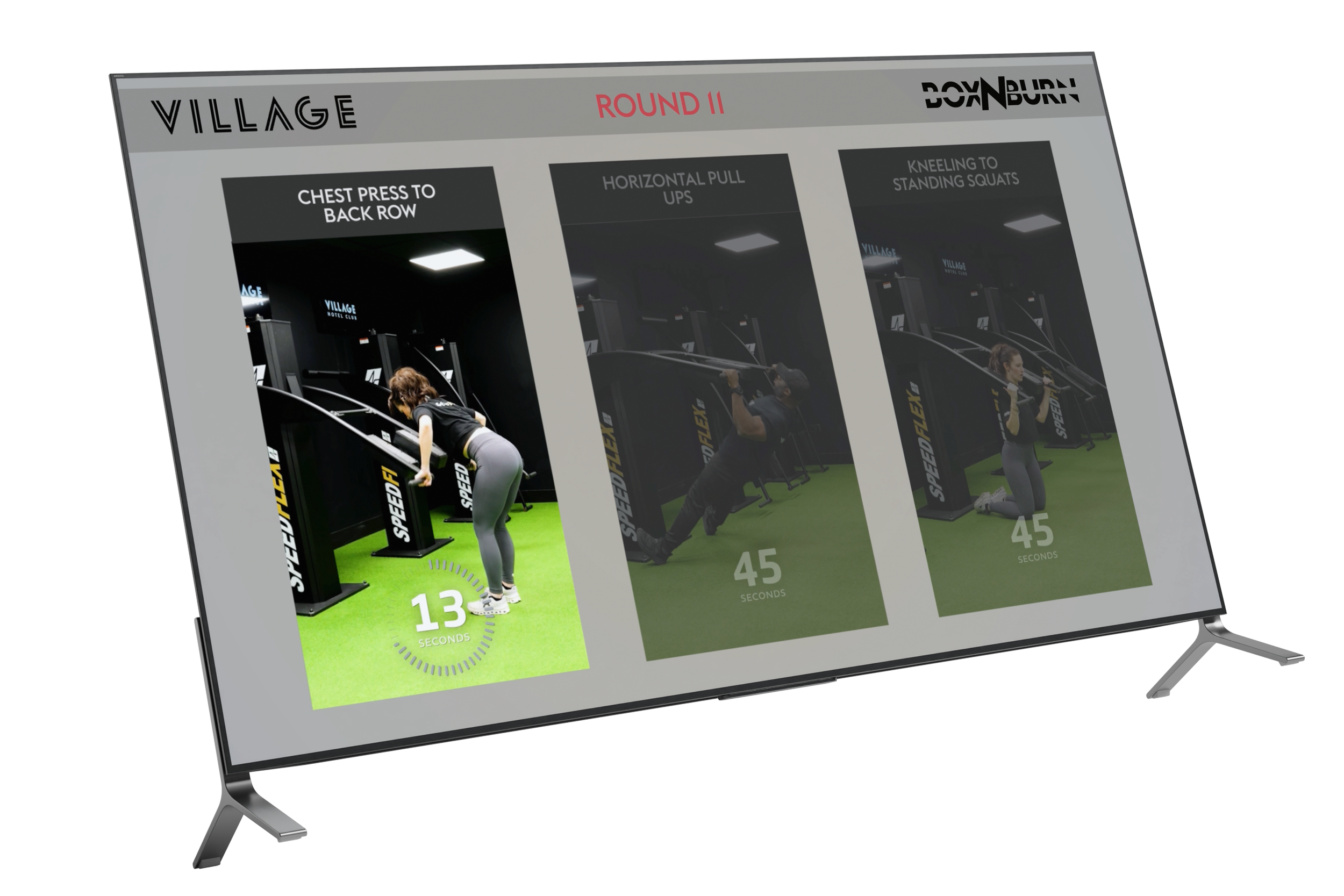 OJHMedia long term content partnership - workout video series for Village Gyms displayed on gym class television screen