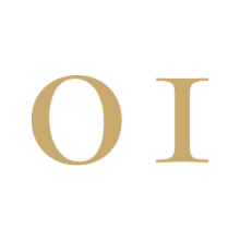 Close-up of the letters 'O' and 'I' in beige on a black background.