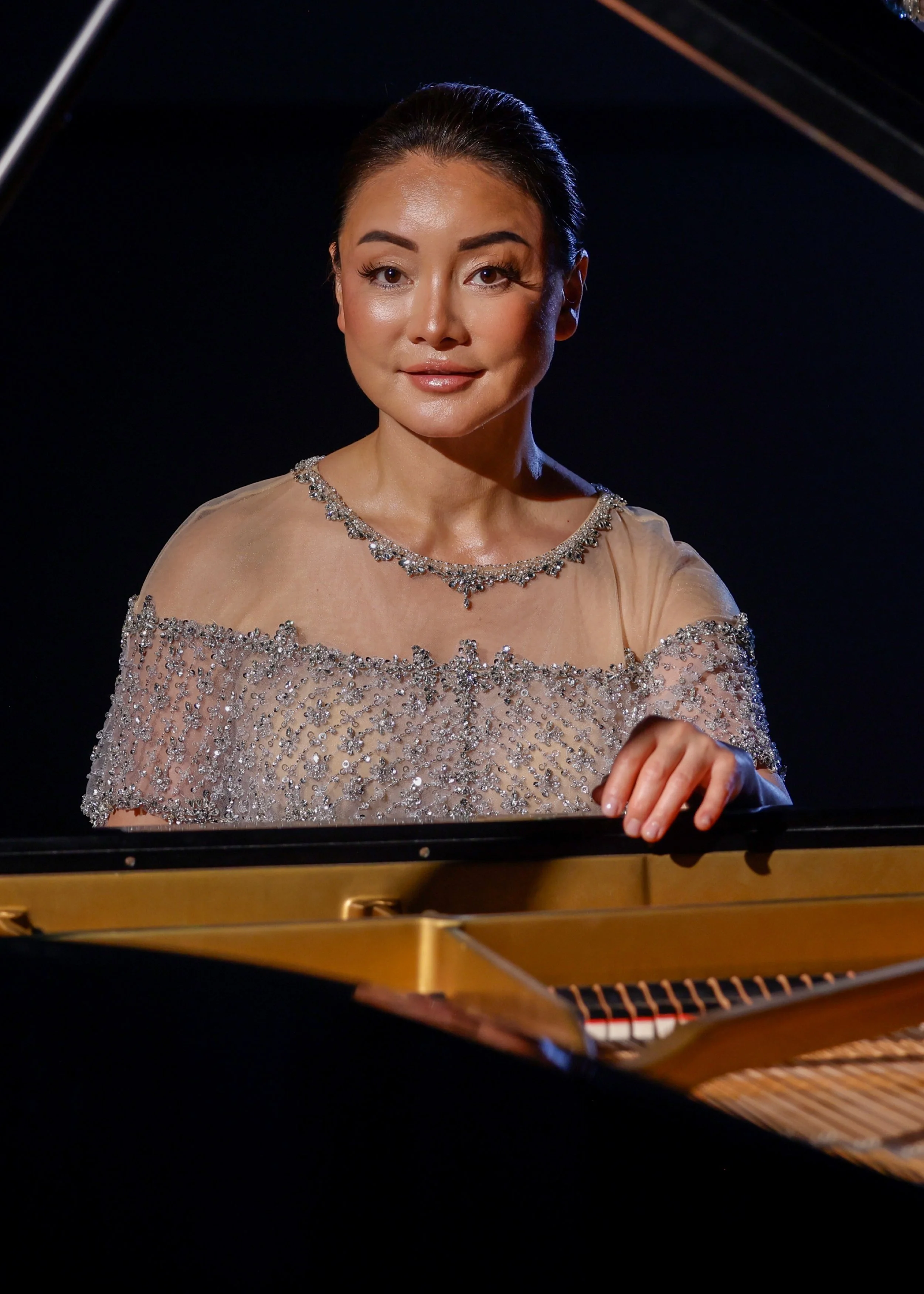 Winnie Wen in full glamour playing a grand piano for Paris shoot.
