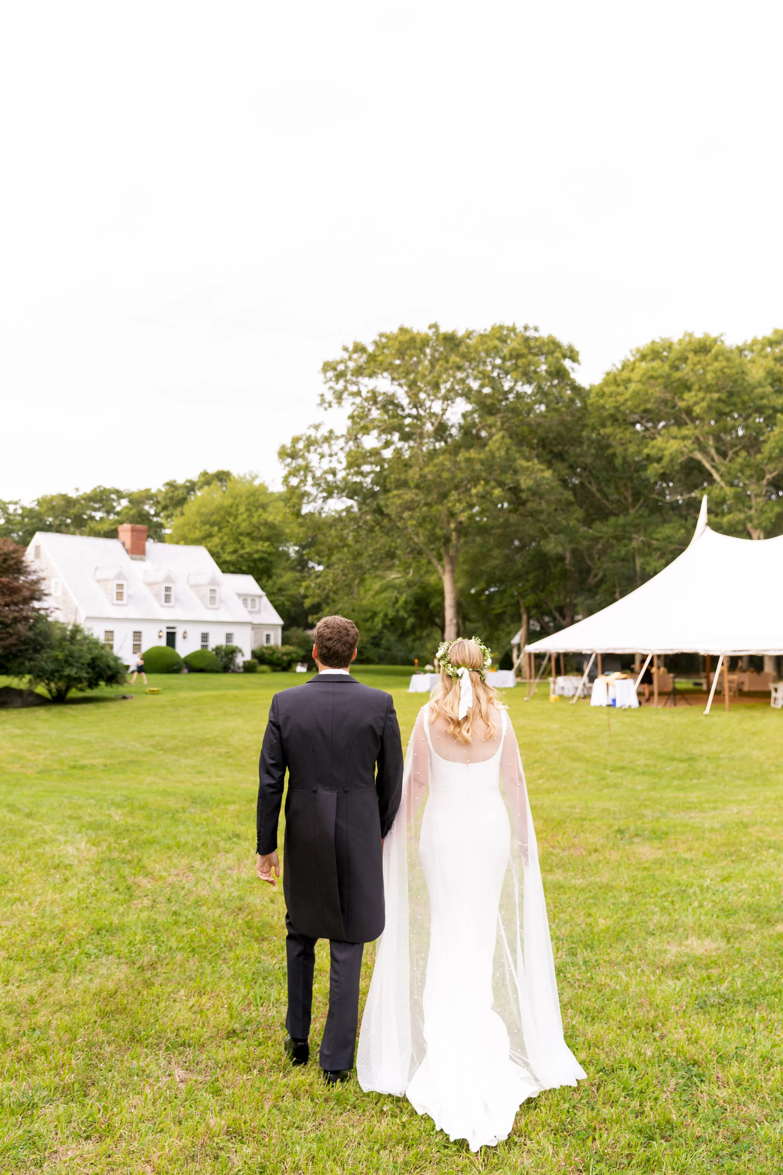 couples wedding portrait with outdoor tent