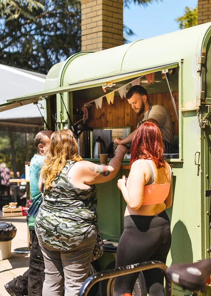Serving food out of a food truck for people who need it