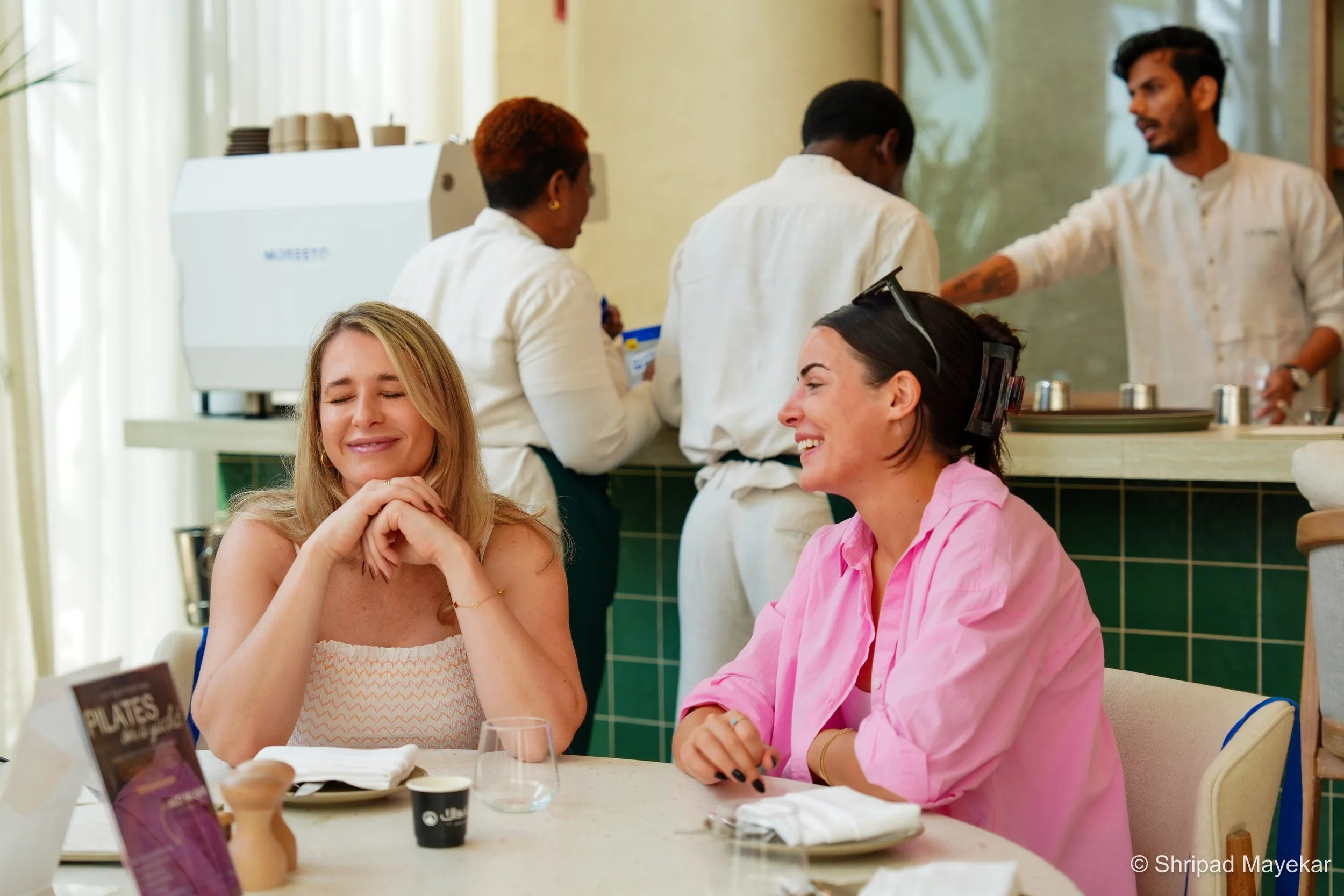 Women in business attending REINV8NT networking event in Dubai. She builds is a networking event for founders, entrepreneurs, and professionals in Dubai scheduled for November 14th from 10 am to 12 pm at a location with 80 seats.
