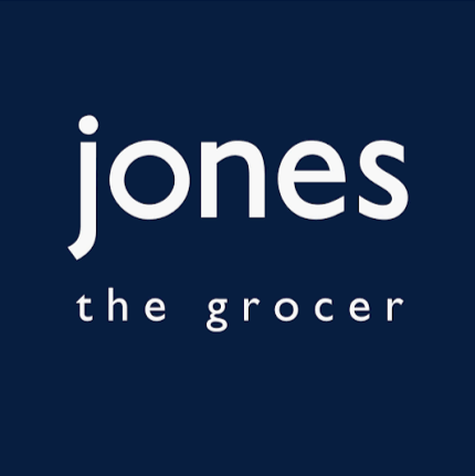 Jones the Grocer logo in white on a dark blue background