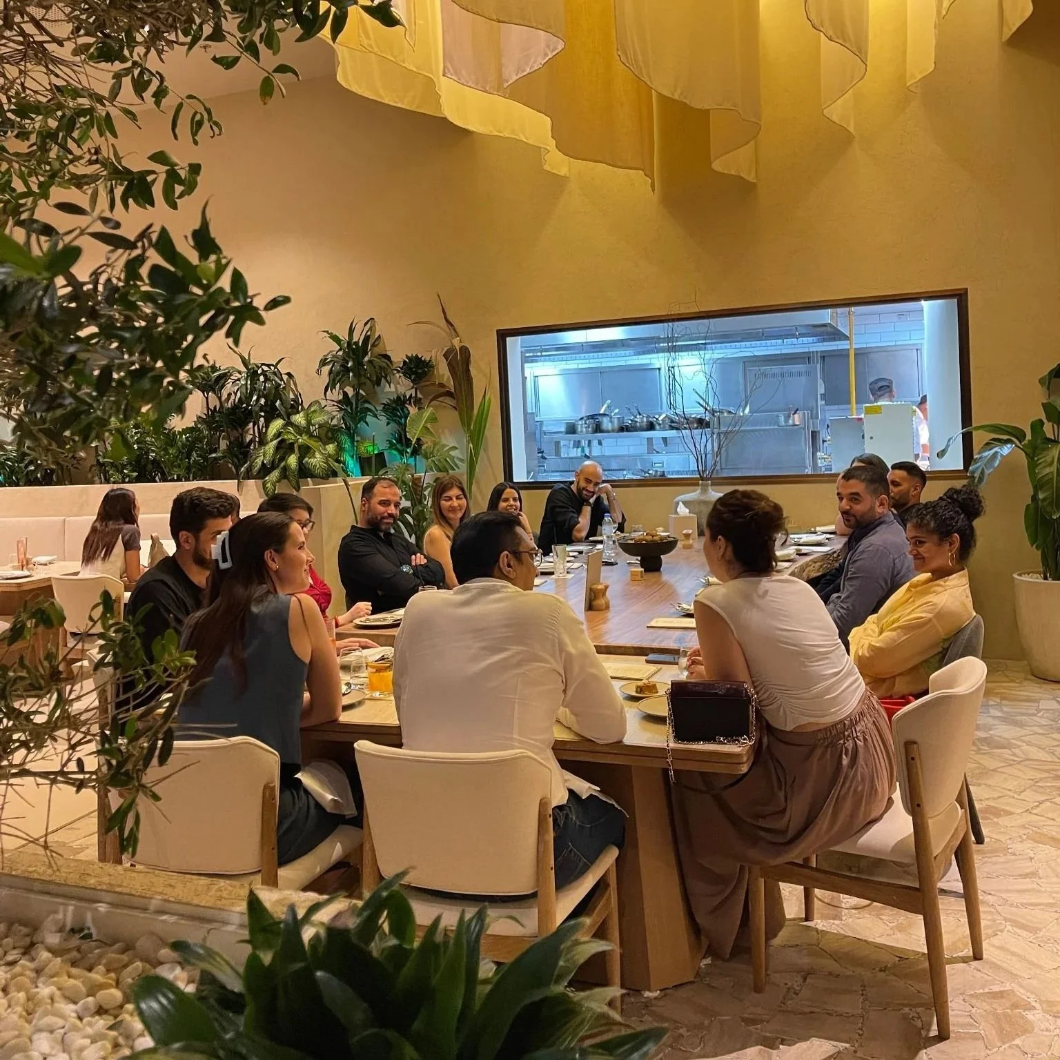 Guests at a REINV8NT Social Night curated dinner in Dubai. Next Social night is with a vision board activity scheduled for October 17 & 18.