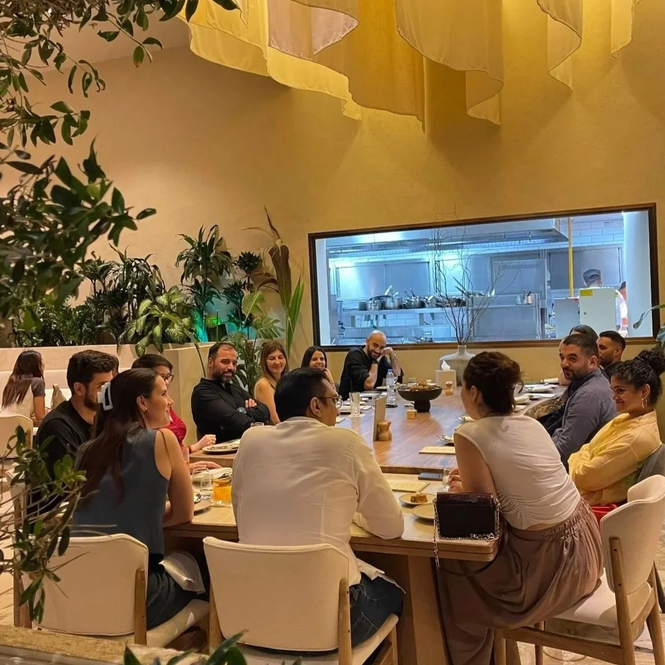 Guests at a REINV8NT Social Night curated dinner in Dubai. Next Social night is with a vision board activity scheduled for October 17 & 18.