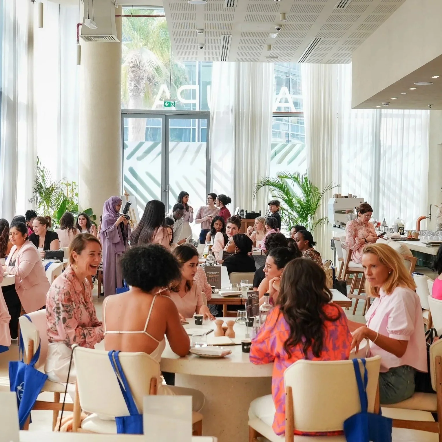 Women networking over brunch at SHE Builds by REINV8NT in Dubai. A networking event for founders, entrepreneurs, and professionals in Dubai scheduled for November 14th from 10 am to 12 pm at a location with 80 seats.