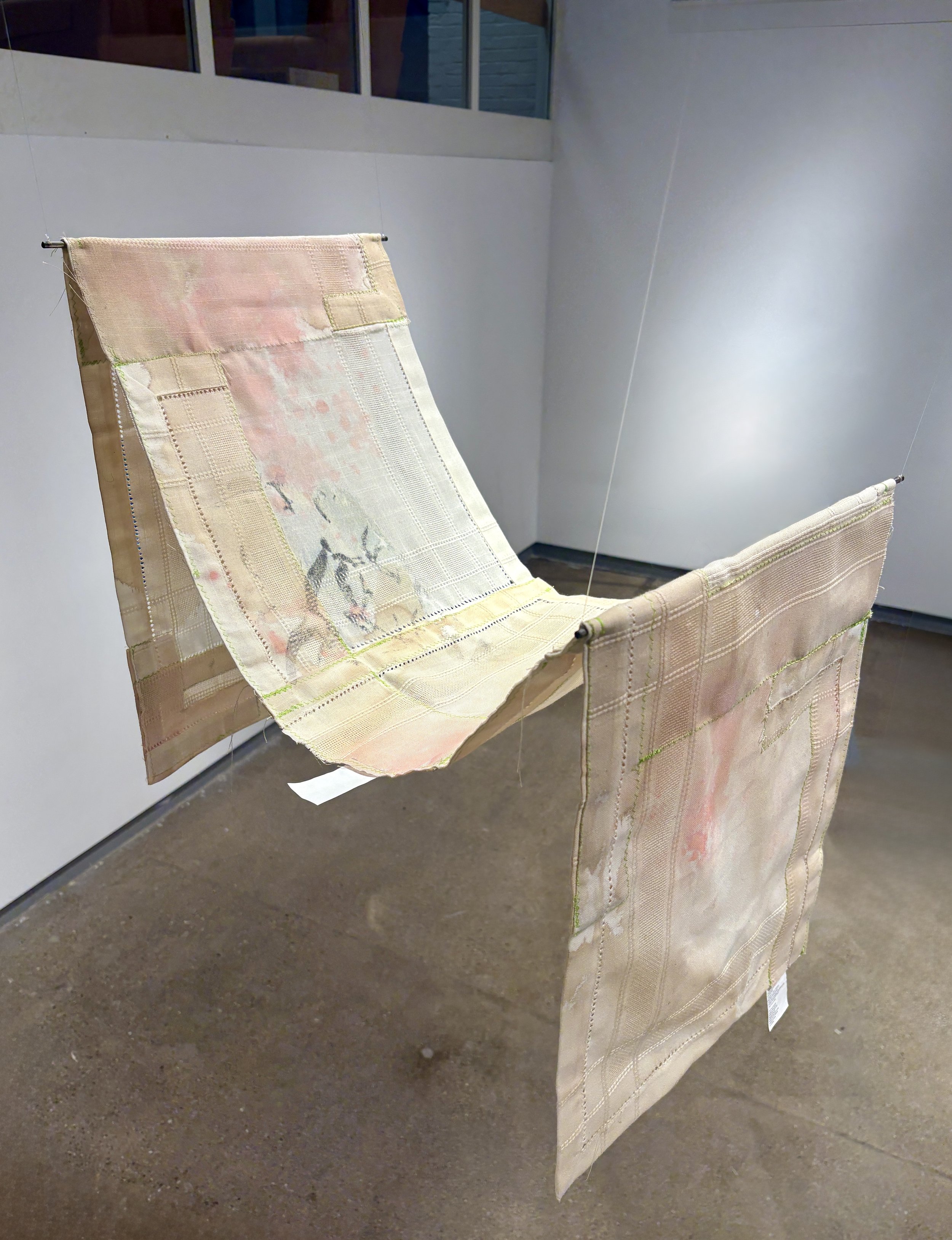 Table Runner, 2026
Polyester napkins, thread, tags, acrylic paint, coffee, laser printed images
42” x 16” x 36”