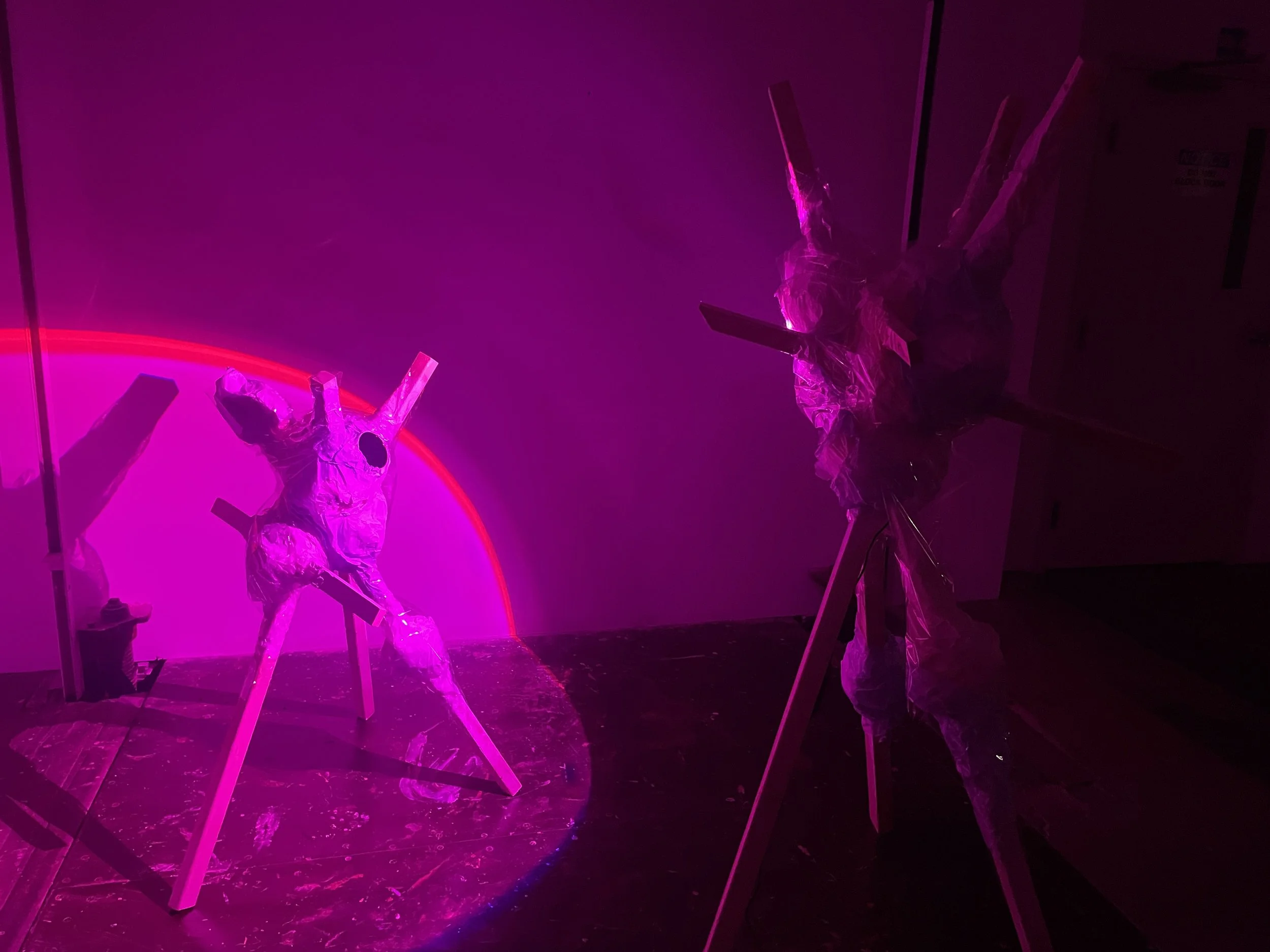 Motherly Confrontation, 2024
Cellophane, Tissue Paper, Acrylic Paint, Plaster Tape, Furring Strips, Sunset Lamp, Compact Mirror
60” x 30” x 60”
