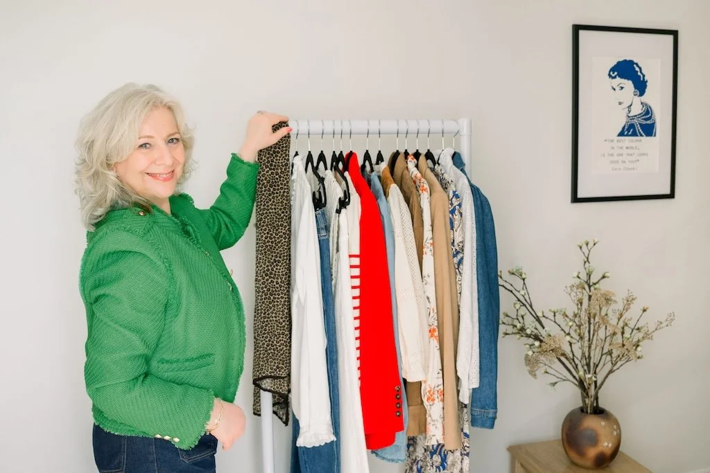 Styling session with clothing rail and outfit selection