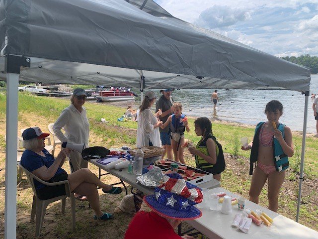 Event 2026 Boat Parade Manning the Table.jpg