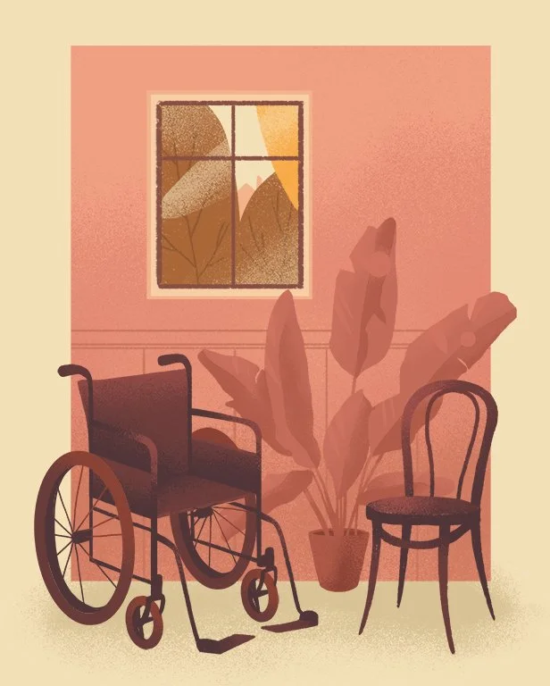empty wheelchair and a chair next to each other