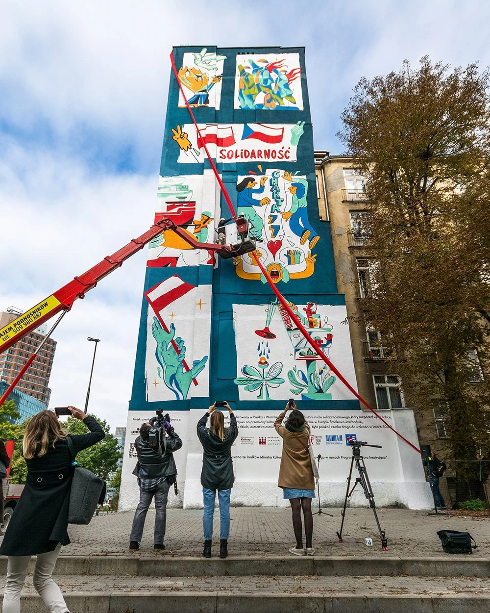 unveiling of a mural on a building