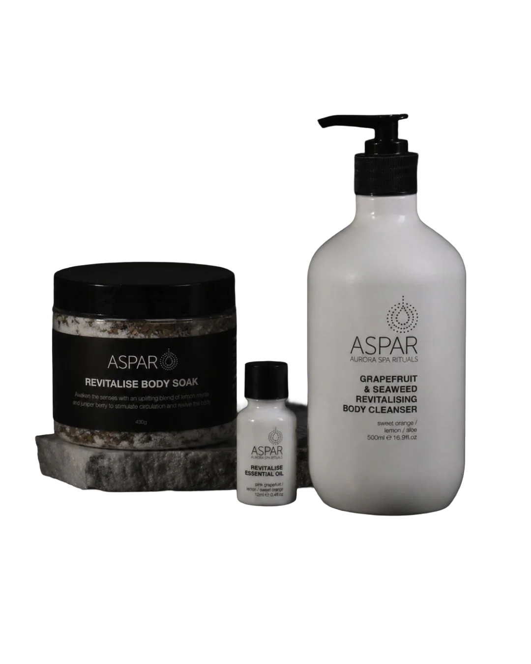Set of three Atar skincare products: Revitalise Body Soak, Grapefruit & Seaweed Revitalising Body Cleanser, and Revitalise Essential Oil, with black and white packaging.