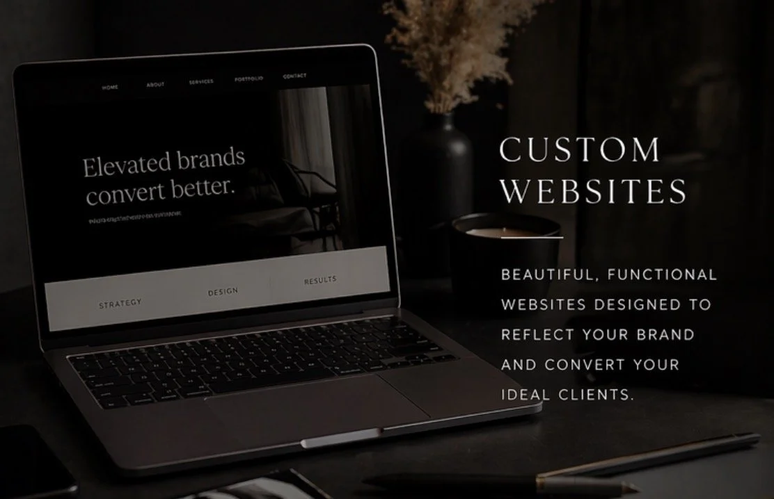 A laptop showing a website with the text "Elevated brands convert better" and a navigation menu, placed on a dark desk with a pen and a phone. A black vase with dried plants and a cup are in the background. Overlay text reads "Custom Websites" and "Beautiful, functional websites designed to reflect your brand and convert your ideal clients."