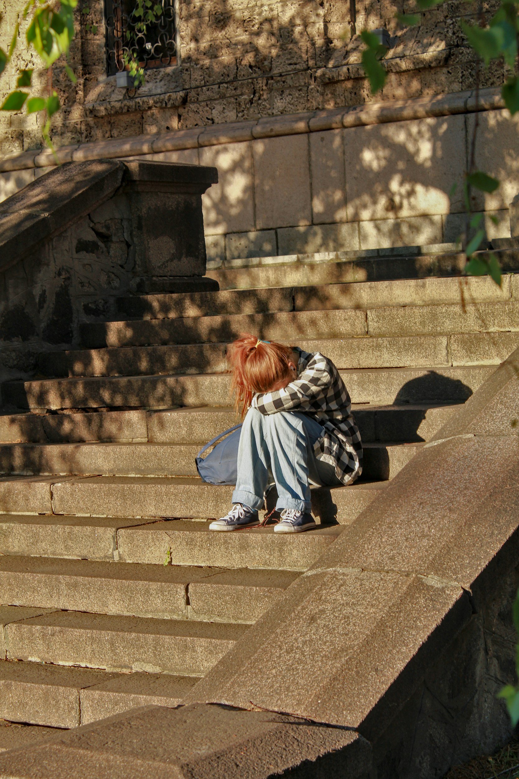 Quiet moment of reflection in nature, inviting presence, self-discovery, and inner connection.