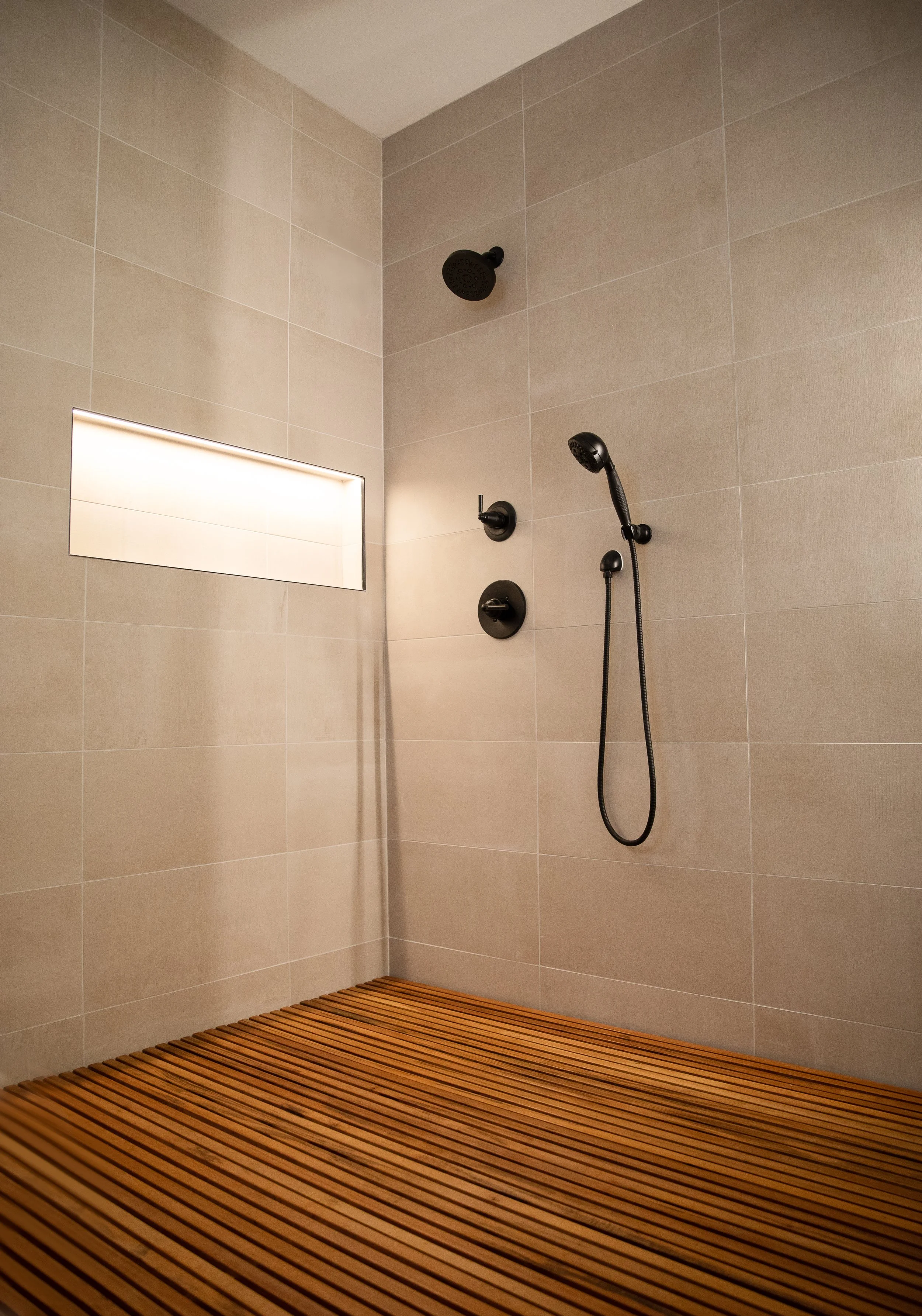 condo-528-shower-riegis-design-co.jpg