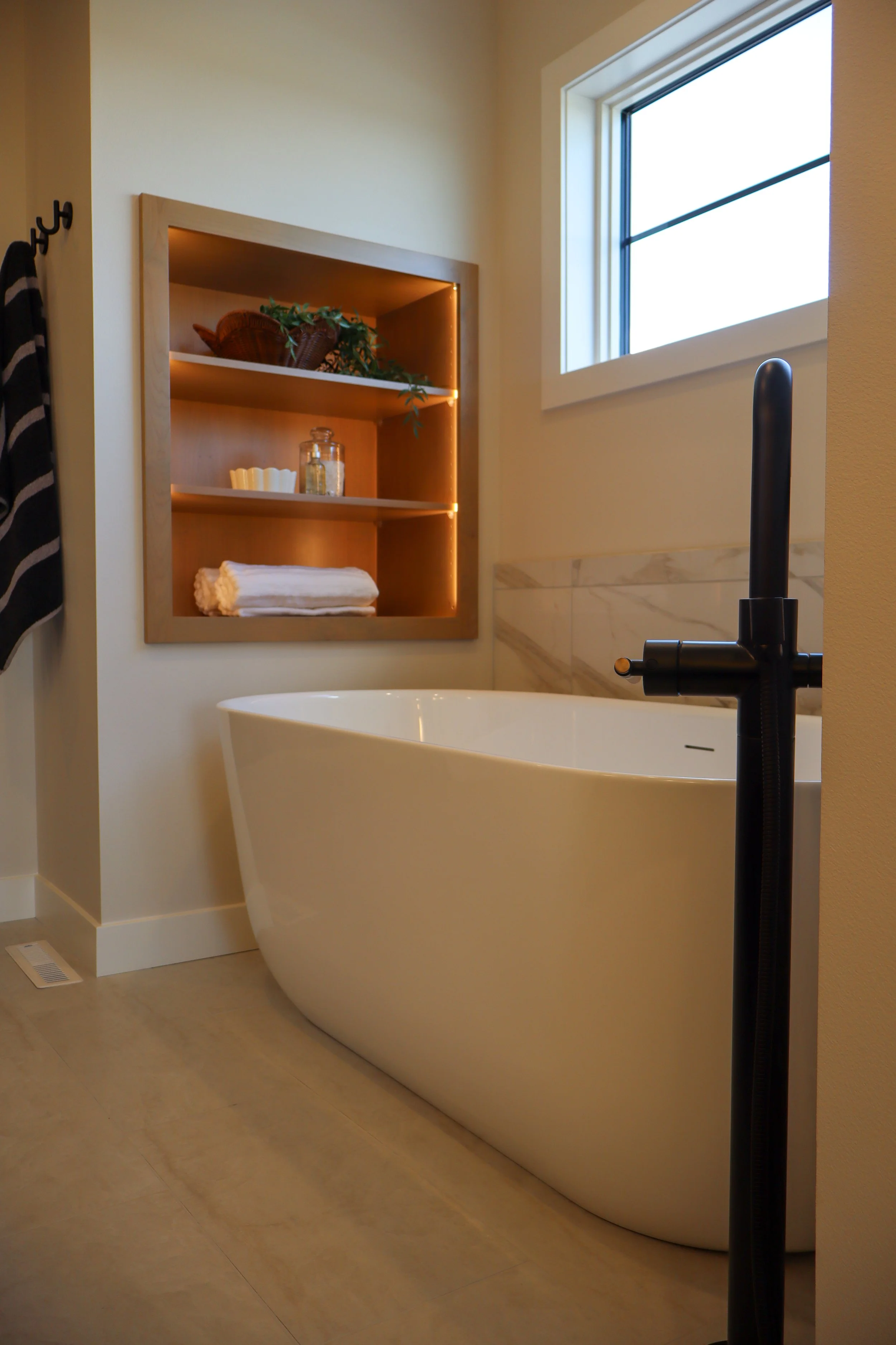 modern-prairie-showcase-bathroom-tub-riegis-design-co.JPG