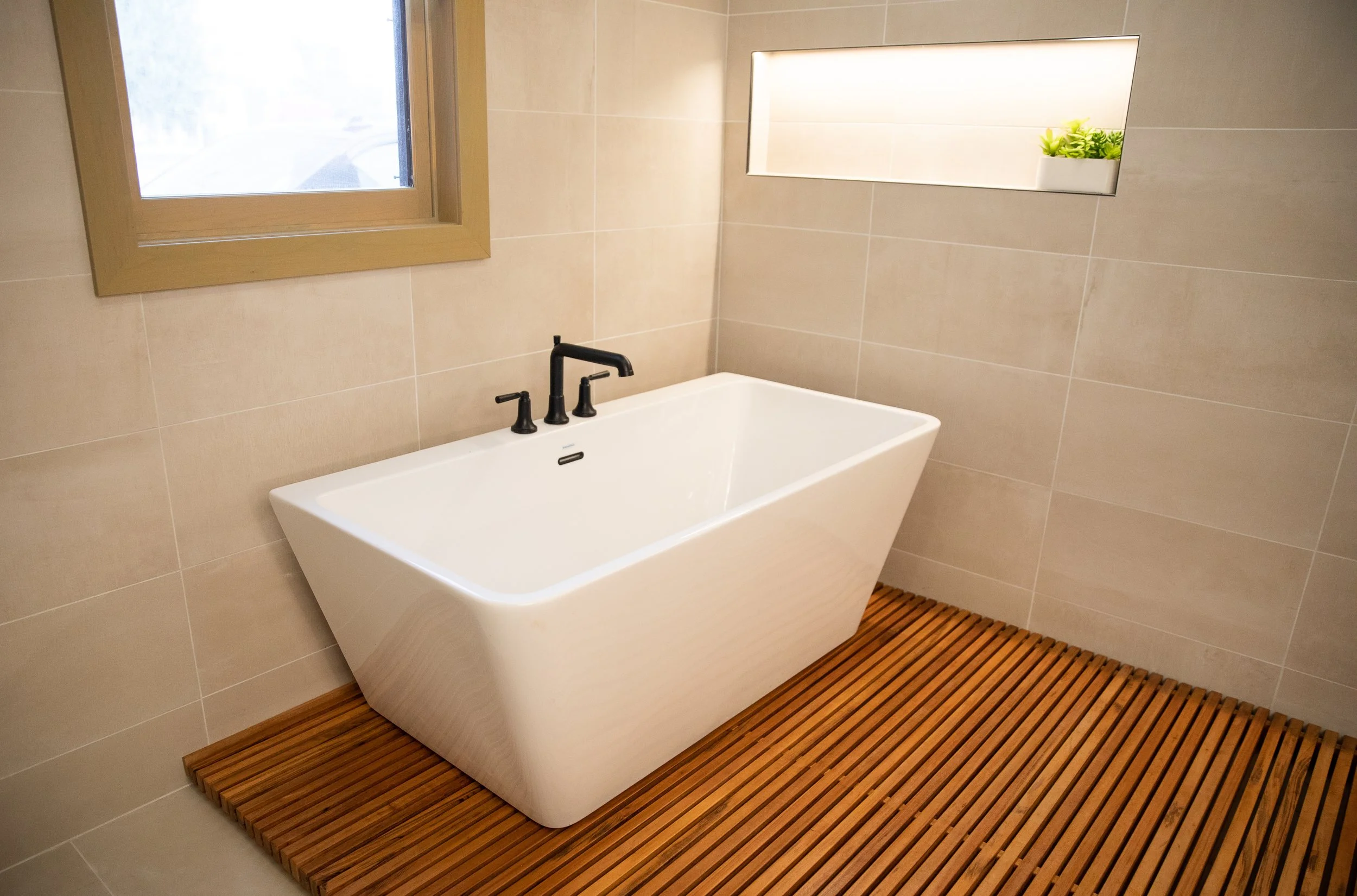 urban-sanctuary-tub-bathroom-riegis-design-co.jpg