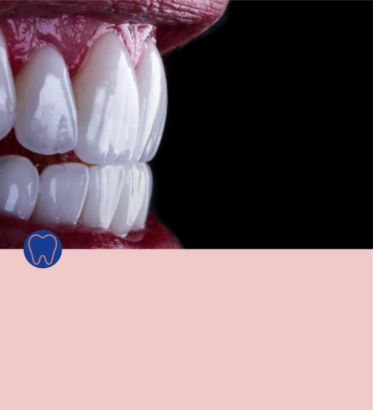 Close-up of a person's teeth and gums, showing healthy, white teeth with the lips slightly parted.