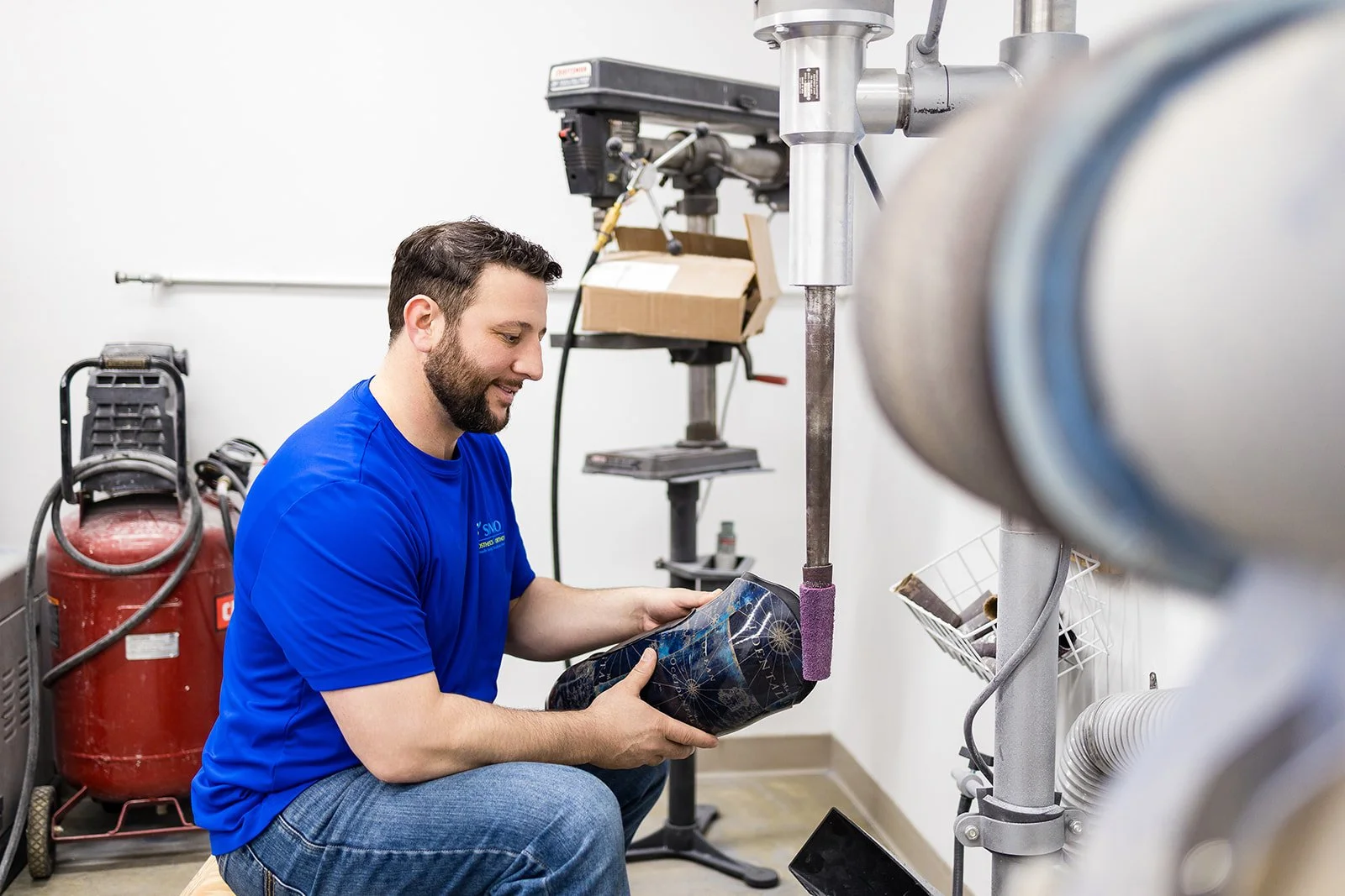 man holding prosthetic leg