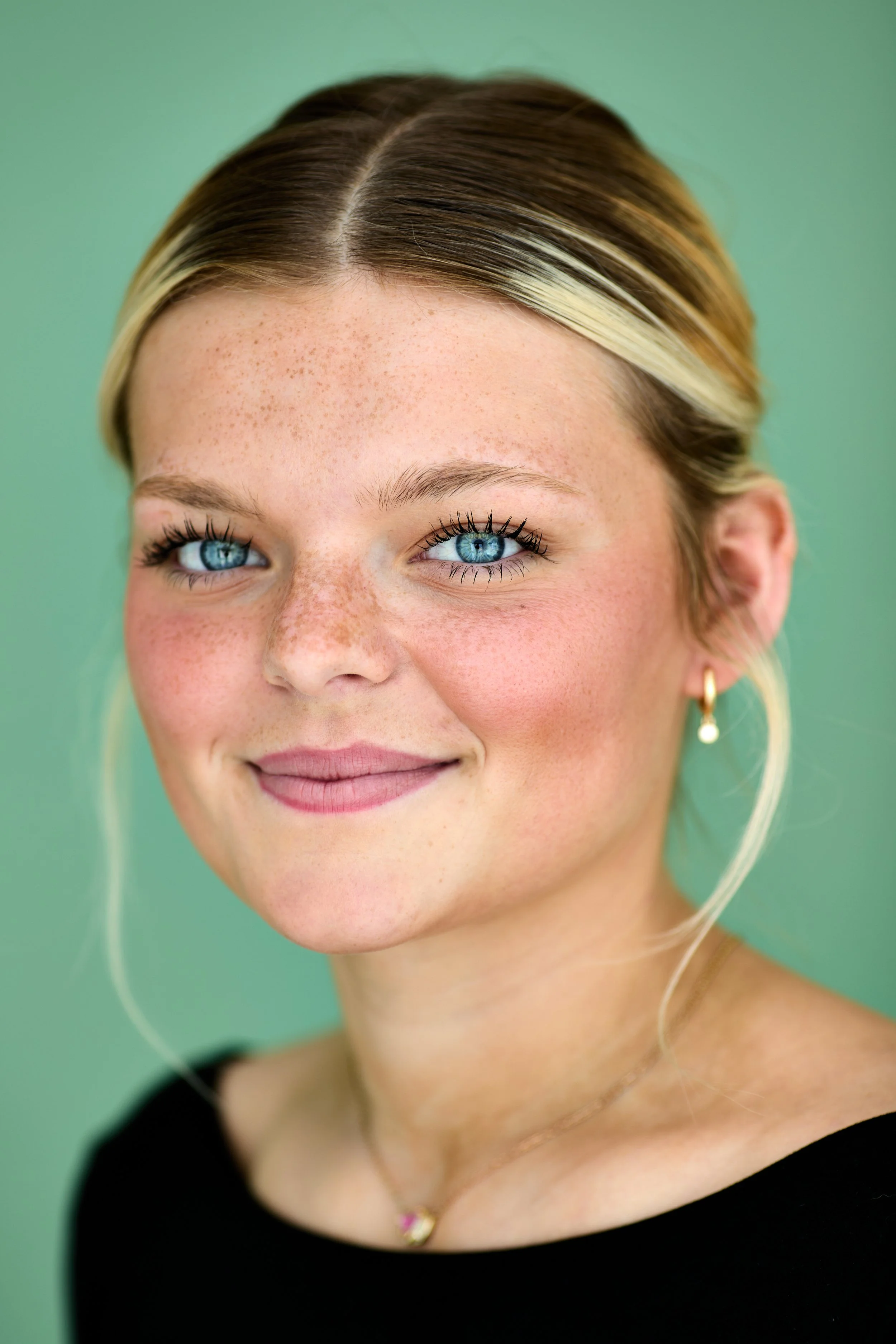 Modern studio portrait with soft lighting and natural skin texture photographed in Fort Wayne, IN.